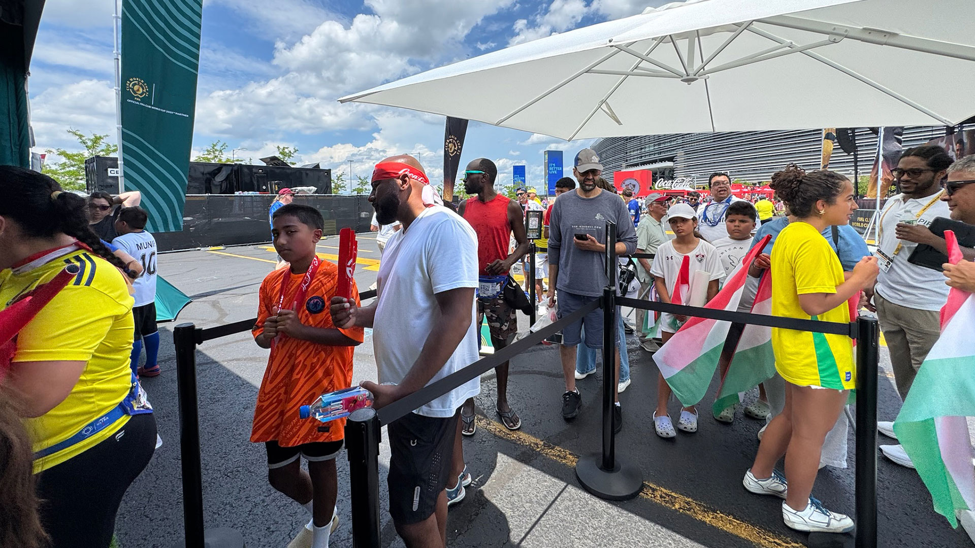 Fans waiting in line for the FIFA Club World Cup fan activation at MetLife Stadium.