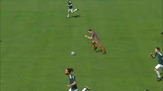 A scanned fan avatar dribbling through a defense in a personalized FIFA Club World Cup highlight.